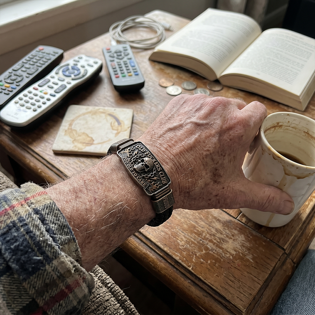 Jessica's father wearing the bracelet at home